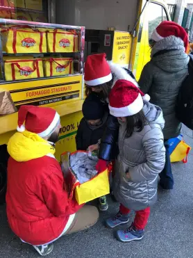 Biraghi di Cavallermaggiore al raduno dei Babbi Natale per i bimbi del Regina Margherita